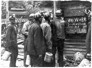 Kentucky miners reading a "No Work" sign