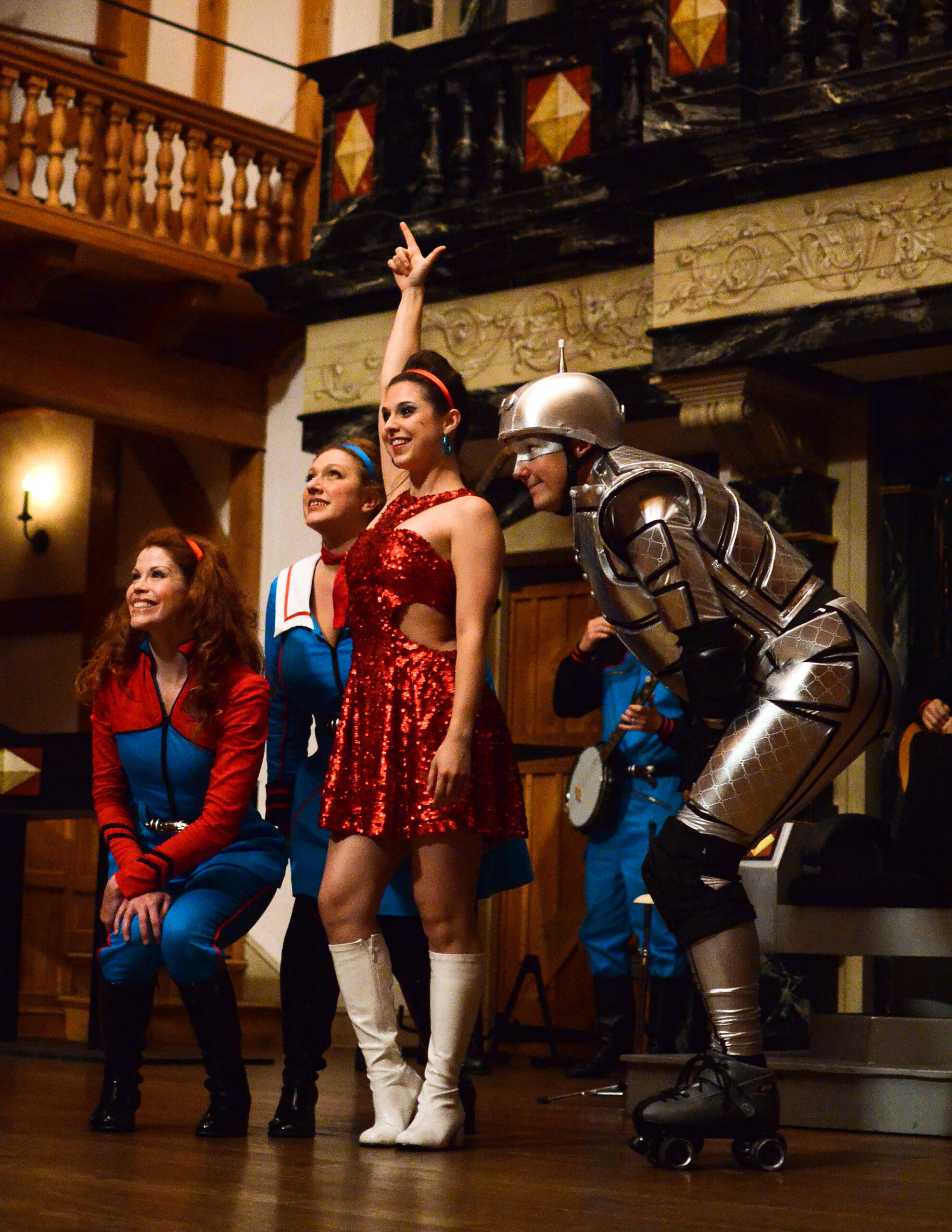 Emily Brown, center as Miranda, from left, Lee Fitzpatrick as Gloria, Allison Glenzer as Petty Officer Anne Arkey, and John Harrell as Ariel in Return to the Forbidden Planet by Bob Carlton at the American Shakespeare Center in 2013. Directed by Jim Warren. Costumes by Erin M. West. Photo by Pat Jarrett.