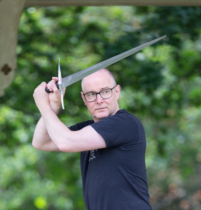The author Guy Windsor with a longsword. Photo by Simply C Photography.