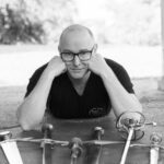 Author photo of Guy Windsor with a collection of swords