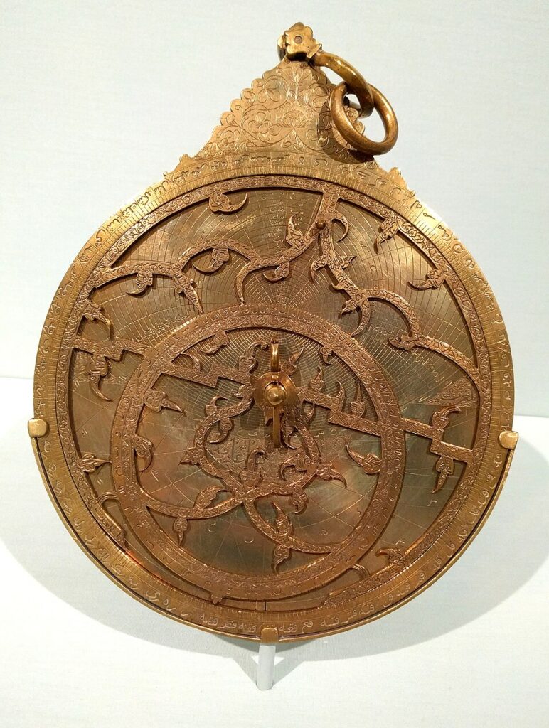 An astrolabe made by Mohammad Amin b. Mohammad Taher and decorated by Abd al-A'imma, 1715. Currently on display at the Saint Louis Art Museum.